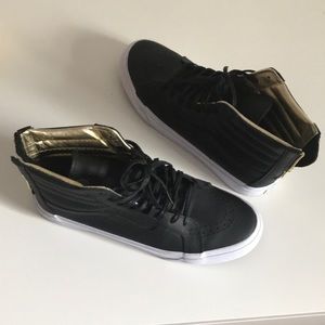 Women’s Vans high top with zipper and gold inside